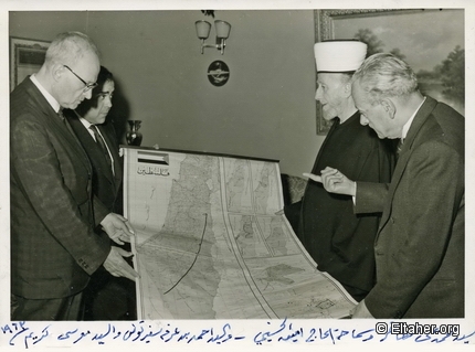 1963 - Studying the map of Palestine